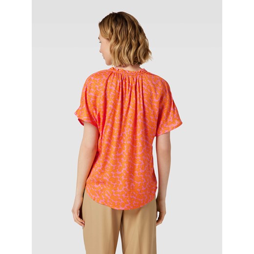 Bluzka damska pomarańczowy w abstrakcyjnym wzorze z krótkim rękawem 
