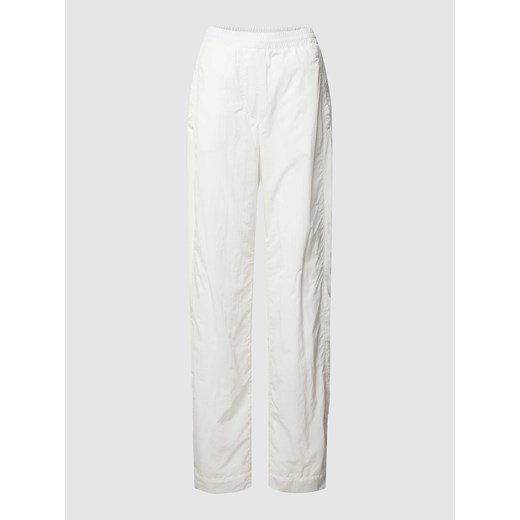Spodnie treningowe w jednolitym kolorze z wpuszczanymi kieszeniami ze sklepu Peek&Cloppenburg  w kategorii Spodnie damskie - zdjęcie 168317404