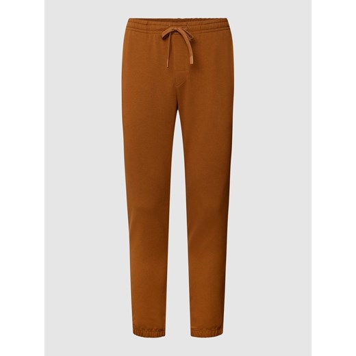 Spodnie dresowe z tunelem model 'Enjoy' ze sklepu Peek&Cloppenburg  w kategorii Spodnie męskie - zdjęcie 168327711