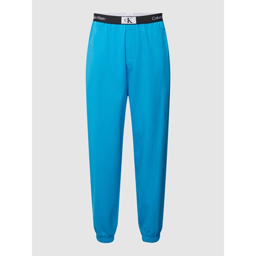 Spodnie dresowe z elastycznym paskiem z logo ze sklepu Peek&Cloppenburg  w kategorii Spodnie męskie - zdjęcie 168336652