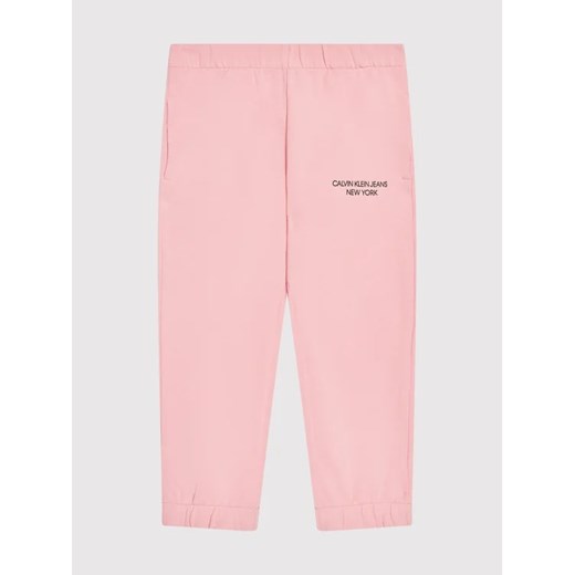 Calvin Klein Jeans Spodnie dresowe Mini Monogram IG0IG01003 Różowy Regular Fit 6Y promocyjna cena MODIVO