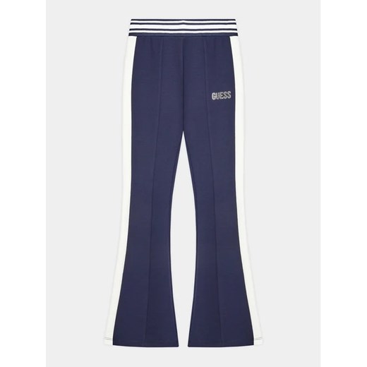 Guess Spodnie materiałowe J3YB09 KAE30 Niebieski Regular Fit ze sklepu MODIVO w kategorii Spodnie dziewczęce - zdjęcie 168386192