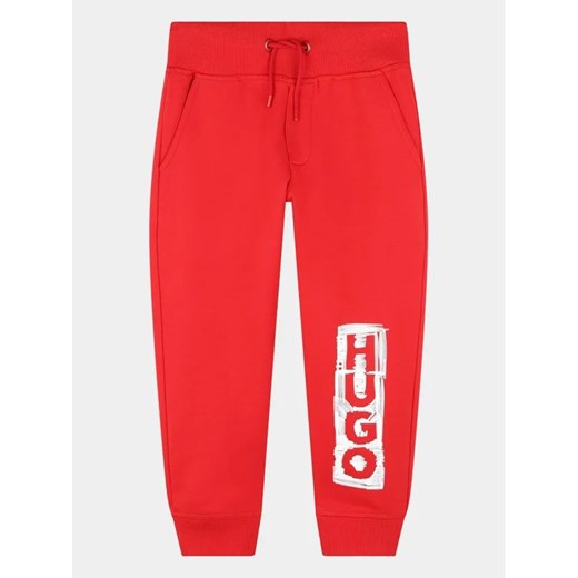 Hugo Spodnie dresowe G24150 D Czerwony Regular Fit ze sklepu MODIVO w kategorii Spodnie chłopięce - zdjęcie 168386243