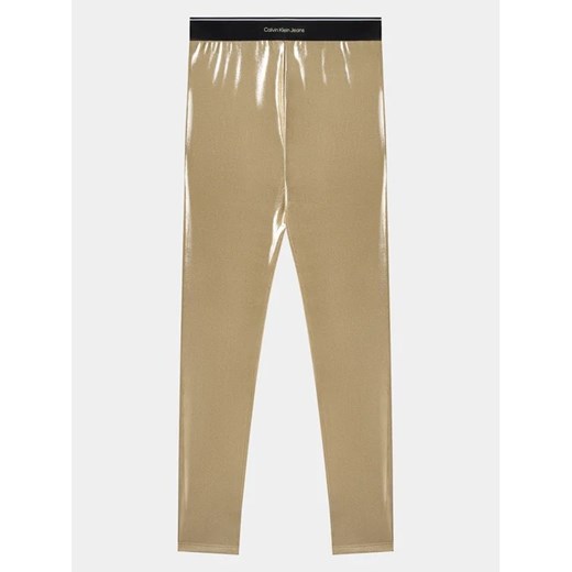 Calvin Klein Jeans Legginsy Metallic IG0IG02403 Złoty Slim Fit ze sklepu MODIVO w kategorii Spodnie dziewczęce - zdjęcie 168391891