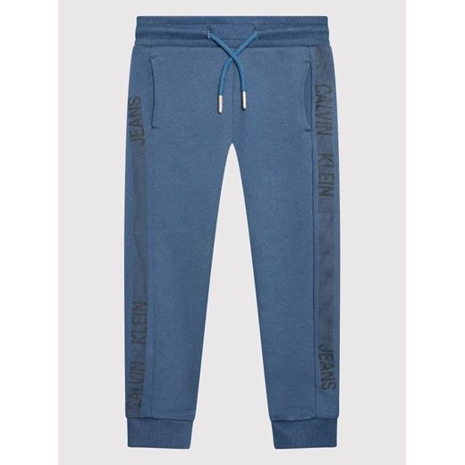 Calvin Klein Jeans Spodnie dresowe Dimension IB0IB01047 Niebieski Regular Fit 12Y MODIVO okazyjna cena