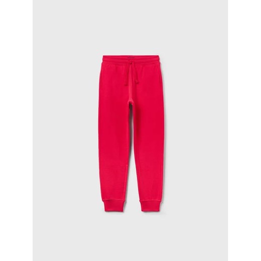 OVS Spodnie dresowe 1593222 Różowy Regular Fit ze sklepu MODIVO w kategorii Spodnie chłopięce - zdjęcie 168466491