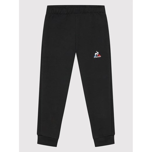 Le Coq Sportif Spodnie dresowe 2210487 Czarny Regular Fit ze sklepu MODIVO w kategorii Spodnie chłopięce - zdjęcie 168486592