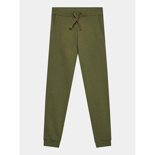 Guess Spodnie dresowe L93Q24 KAUG0 Zielony Regular Fit ze sklepu MODIVO w kategorii Spodnie chłopięce - zdjęcie 168501063