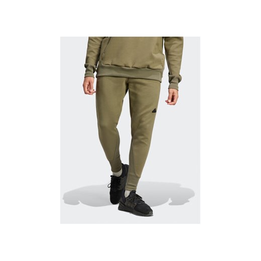 adidas Spodnie dresowe Z.N.E. Premium IN5103 Zielony Regular Fit ze sklepu MODIVO w kategorii Spodnie męskie - zdjęcie 168505871