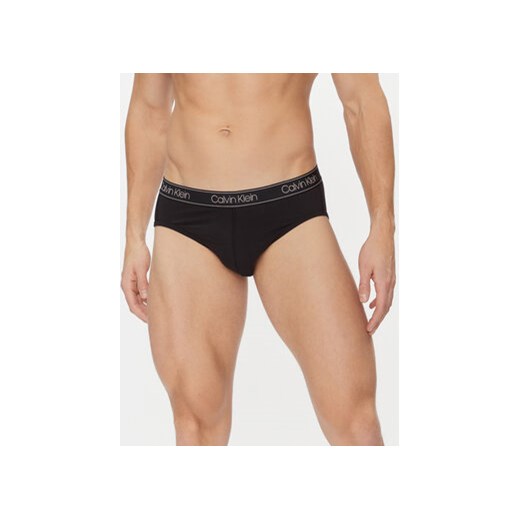 Calvin Klein Underwear Slipy 000NB2863A Czarny Regular Fit ze sklepu MODIVO w kategorii Majtki męskie - zdjęcie 168507221