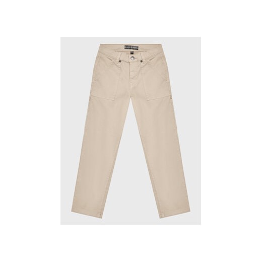 Guess Spodnie materiałowe L3RB10 WEDY1 Beżowy Relaxed Fit ze sklepu MODIVO w kategorii Spodnie chłopięce - zdjęcie 168512184