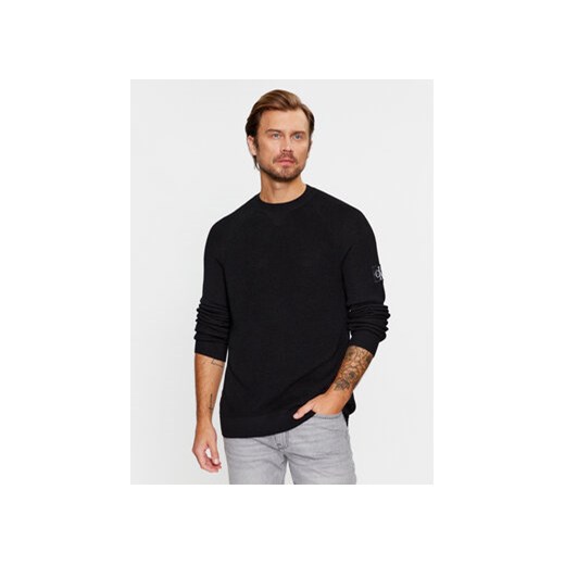 Calvin Klein Jeans Sweter J30J325092 Czarny Regular Fit ze sklepu MODIVO w kategorii Swetry męskie - zdjęcie 168512194