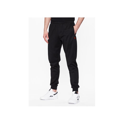 Ellesse Spodnie dresowe Bertoni SHR04351 Czarny Regular Fit ze sklepu MODIVO w kategorii Spodnie męskie - zdjęcie 168514884