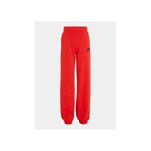Tommy Hilfiger Spodnie dresowe KG0KG07806 Czerwony Regular Fit ze sklepu MODIVO w kategorii Spodnie chłopięce - zdjęcie 168518414