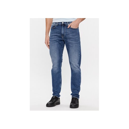 Calvin Klein Jeans Jeansy J30J324193 Niebieski Slim Taper Fit ze sklepu MODIVO w kategorii Jeansy męskie - zdjęcie 168528894