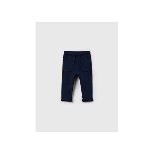 OVS Spodnie dresowe 1443180 Granatowy Regular Fit ze sklepu MODIVO w kategorii Spodnie chłopięce - zdjęcie 168531981