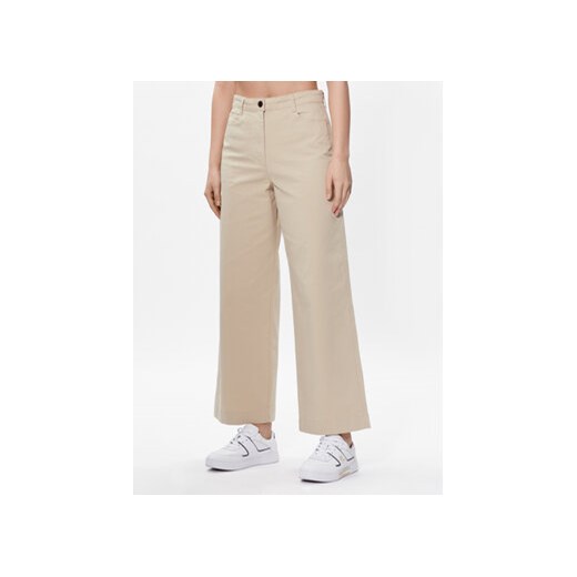 Tommy Hilfiger Spodnie materiałowe 1985 WW0WW38726 Beżowy Regular Fit ze sklepu MODIVO w kategorii Spodnie damskie - zdjęcie 168543683