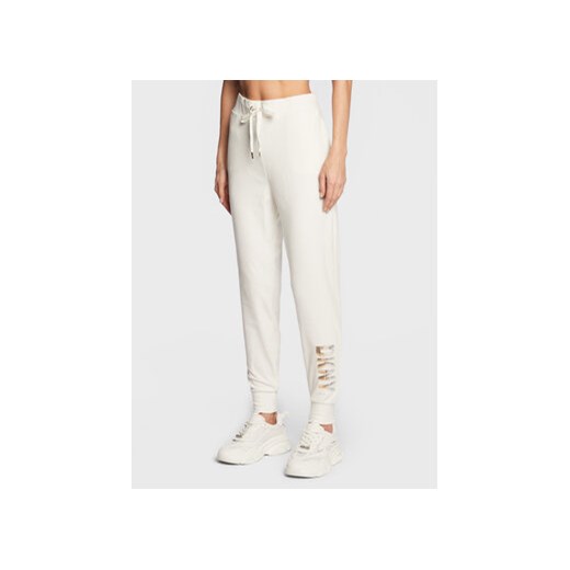DKNY Spodnie dresowe P2MF7OKO Biały Regular Fit ze sklepu MODIVO w kategorii Spodnie damskie - zdjęcie 168551300
