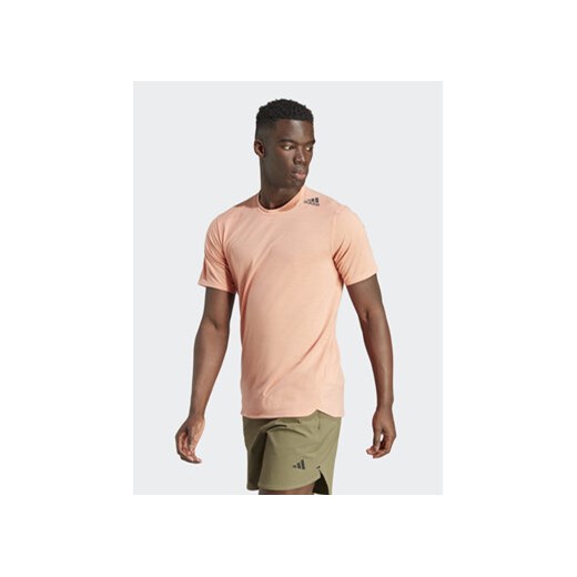 adidas Koszulka techniczna Designed for Training IL1443 Pomarańczowy Slim Fit ze sklepu MODIVO w kategorii T-shirty męskie - zdjęcie 168556383
