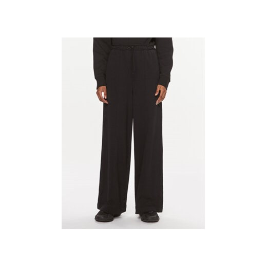 Calvin Klein Performance Spodnie dresowe 00GWS3P600 Czarny Wide Leg ze sklepu MODIVO w kategorii Spodnie damskie - zdjęcie 168559010