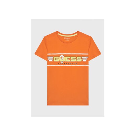 Guess T-Shirt L3RI17 K8HM0 Pomarańczowy Regular Fit ze sklepu MODIVO w kategorii T-shirty chłopięce - zdjęcie 168559944