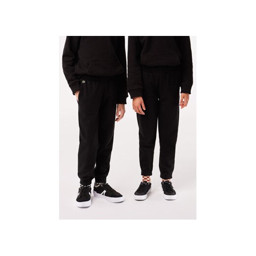 Lacoste Spodnie dresowe XJ9728 Czarny Regular Fit ze sklepu MODIVO w kategorii Spodnie chłopięce - zdjęcie 168564892