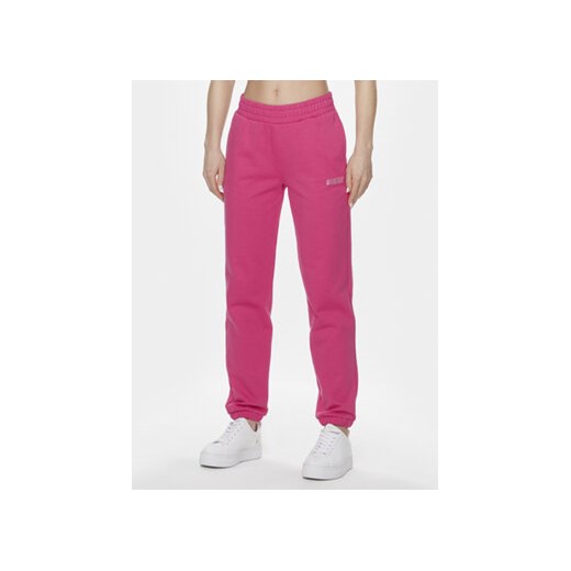Guess Spodnie dresowe Eleanora V4RB10 KC5O0 Różowy Regular Fit ze sklepu MODIVO w kategorii Spodnie damskie - zdjęcie 168571371