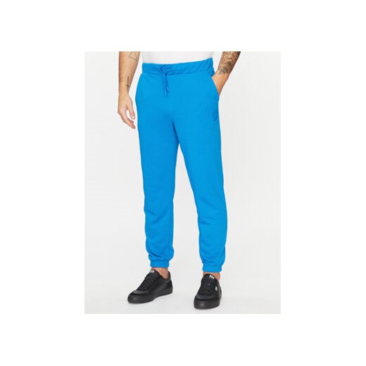 4F Spodnie dresowe 4FAW23TTROM453 Niebieski Regular Fit ze sklepu MODIVO w kategorii Spodnie męskie - zdjęcie 168576840