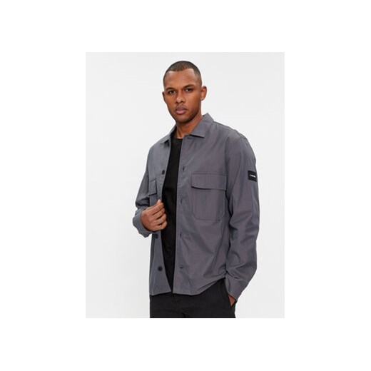 Calvin Klein Koszula K10K109920 Szary Regular Fit ze sklepu MODIVO w kategorii Koszule męskie - zdjęcie 168580001
