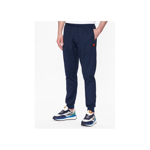 Ellesse Spodnie dresowe Bertoni SHR04351 Granatowy Regular Fit ze sklepu MODIVO w kategorii Spodnie męskie - zdjęcie 168581830