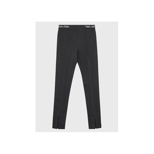 Calvin Klein Jeans Legginsy Logo Tape IG0IG01986 Czarny Slim Fit ze sklepu MODIVO w kategorii Spodnie dziewczęce - zdjęcie 168586611