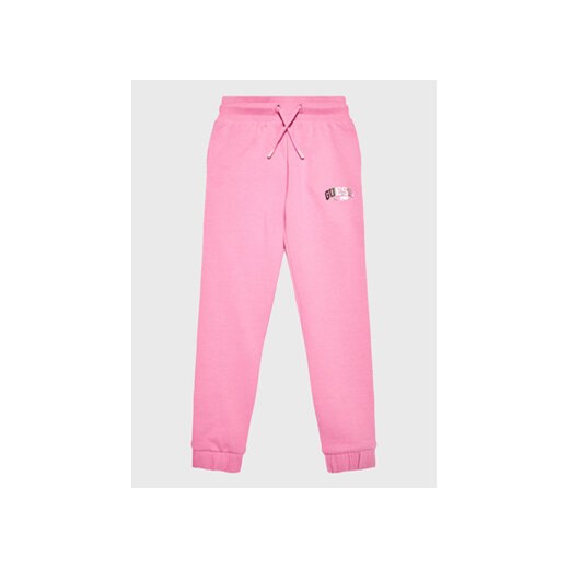 Guess Spodnie dresowe J3RQ11 KA6R0 Różowy Regular Fit ze sklepu MODIVO w kategorii Spodnie dziewczęce - zdjęcie 168587372