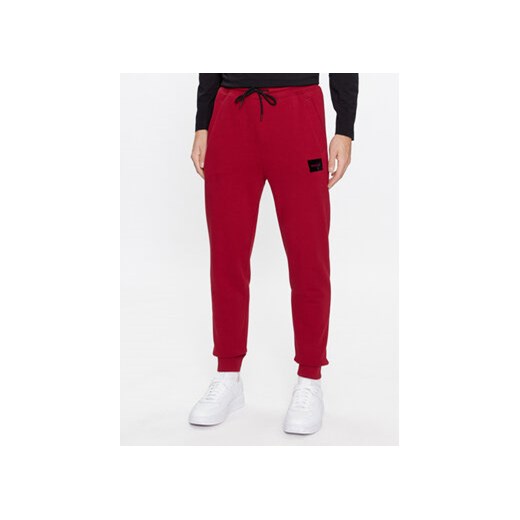 Hugo Spodnie dresowe Doak_V 50501021 Czerwony Regular Fit ze sklepu MODIVO w kategorii Spodnie męskie - zdjęcie 168594262