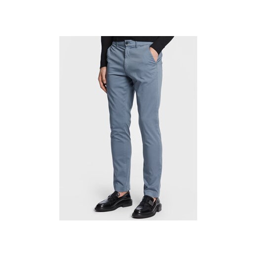 Calvin Klein Chinosy Sateen K10K109914 Niebieski Slim Fit ze sklepu MODIVO w kategorii Spodnie męskie - zdjęcie 168596781