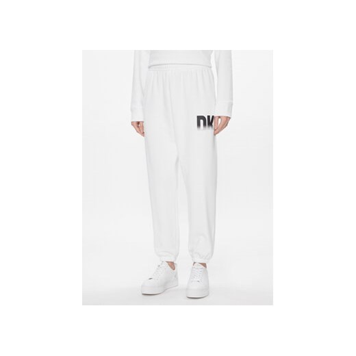 DKNY Sport Spodnie dresowe DP3P3379 Biały Relaxed Fit ze sklepu MODIVO w kategorii Spodnie damskie - zdjęcie 168604950
