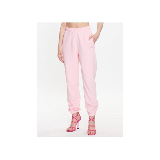ROTATE Spodnie dresowe Crystal 700157043 Różowy Relaxed Fit ze sklepu MODIVO w kategorii Spodnie damskie - zdjęcie 168606303