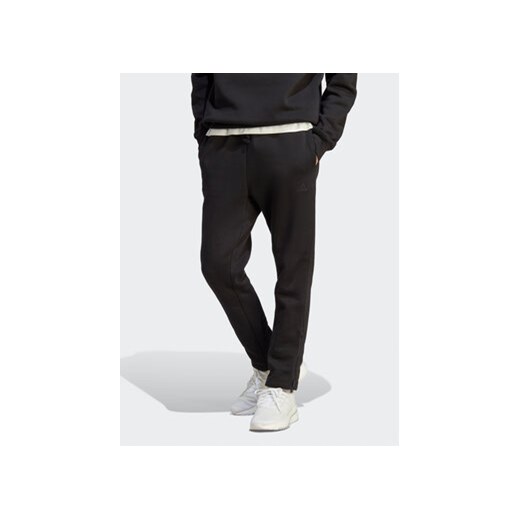 adidas Spodnie dresowe All SZN Fleece IB4070 Czarny Regular Fit ze sklepu MODIVO w kategorii Spodnie męskie - zdjęcie 168617521