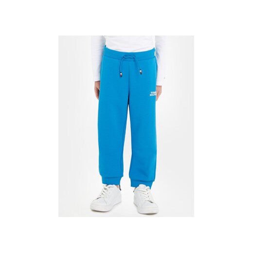 Tommy Hilfiger Spodnie dresowe Logo KB0KB08650 Niebieski Regular Fit ze sklepu MODIVO w kategorii Spodnie chłopięce - zdjęcie 168617681