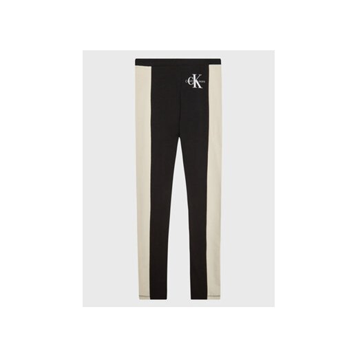 Calvin Klein Jeans Legginsy Colour Block Monogram IG0IG01695 Czarny Slim Fit ze sklepu MODIVO w kategorii Spodnie dziewczęce - zdjęcie 168620320