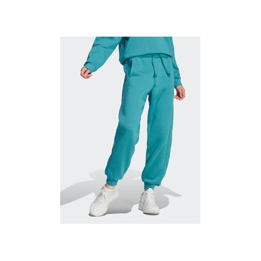 adidas Spodnie dresowe ALL SZN Fleece IM0333 Niebieski Loose Fit ze sklepu MODIVO w kategorii Spodnie damskie - zdjęcie 168630644