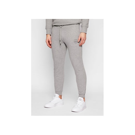 Jack&Jones Spodnie dresowe Gordon 12165322 Szary Regular Fit ze sklepu MODIVO w kategorii Spodnie męskie - zdjęcie 168631330