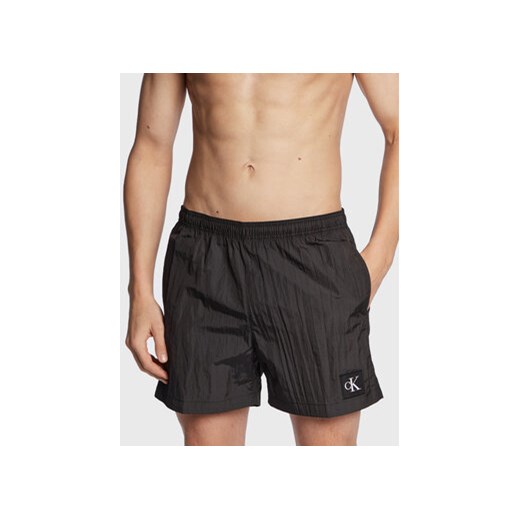 Calvin Klein Swimwear Szorty kąpielowe KM0KM00819 Czarny Regular Fit ze sklepu MODIVO w kategorii Kąpielówki - zdjęcie 168632440