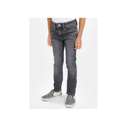 Calvin Klein Jeans Jeansy IB0IB01717 Szary Skinny Fit ze sklepu MODIVO w kategorii Spodnie chłopięce - zdjęcie 168642741