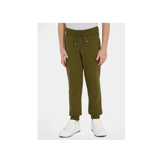 Tommy Hilfiger Spodnie dresowe KS0KS00207 S Zielony Regular Fit ze sklepu MODIVO w kategorii Spodnie chłopięce - zdjęcie 168650183