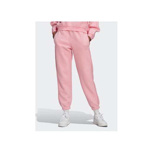 adidas Spodnie dresowe Originals HL9148 Różowy Relaxed Fit ze sklepu MODIVO w kategorii Spodnie damskie - zdjęcie 168651780