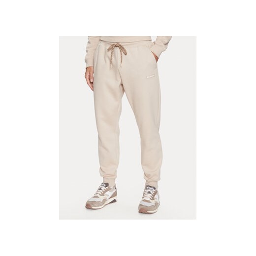 Columbia Spodnie dresowe Marble Canyon™ Heavyweight Fleece Pant Brązowy Regular Fit ze sklepu MODIVO w kategorii Spodnie męskie - zdjęcie 168652993