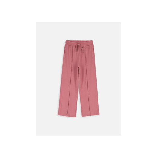 Coccodrillo Spodnie materiałowe ZC3120102MGK Różowy Regular Fit ze sklepu MODIVO w kategorii Spodnie dziewczęce - zdjęcie 168665380