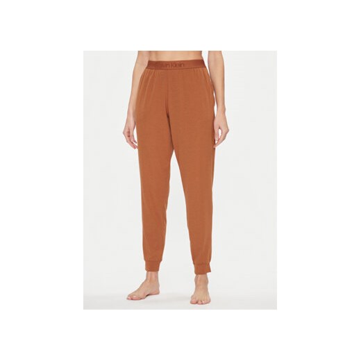 Calvin Klein Underwear Spodnie piżamowe 000QS7004E Brązowy Regular Fit ze sklepu MODIVO w kategorii Piżamy damskie - zdjęcie 168665531