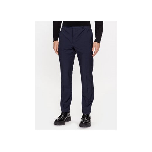 Calvin Klein Spodnie garniturowe K10K111722 Granatowy Slim Fit ze sklepu MODIVO w kategorii Spodnie męskie - zdjęcie 168670114