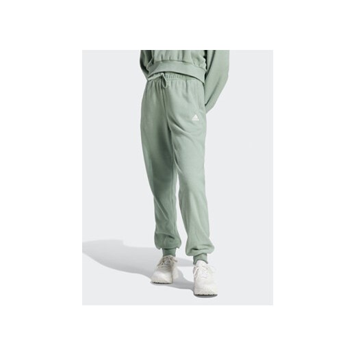 adidas Spodnie dresowe IR8372 Zielony Regular Fit ze sklepu MODIVO w kategorii Spodnie damskie - zdjęcie 168675233